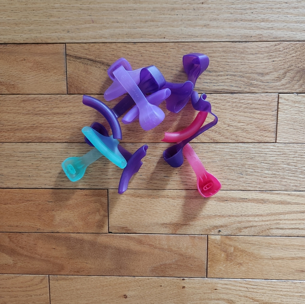Bag of sippy cup anti leak stoppers take and toss cups